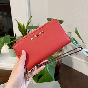 Michael Kors zip around wristlet - terractta